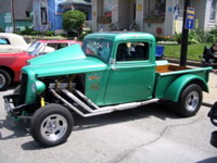 Green Ford Pickup (with bullet holes?)