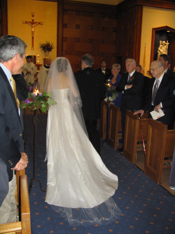 Bride and her father reach the altar